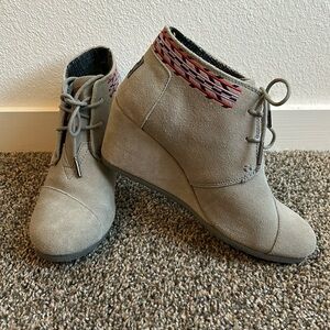 Grey wedge Toms booties. Purple, red, and black embroidery accent.